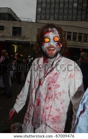 LONDON - OCTOBER 8: The Annual Zombie Walk London People dress as Zombies and scare people in London to raise cash for St. Mungos homeless shelter. London October 8, 2011 in London, England.