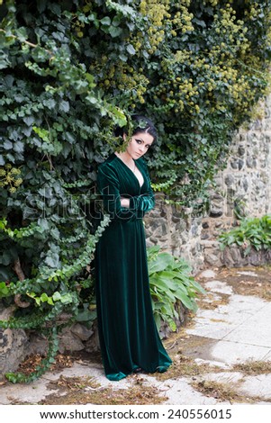Unusual beautiful bride in a green dress