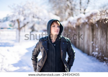 Young girl walking in the winter
