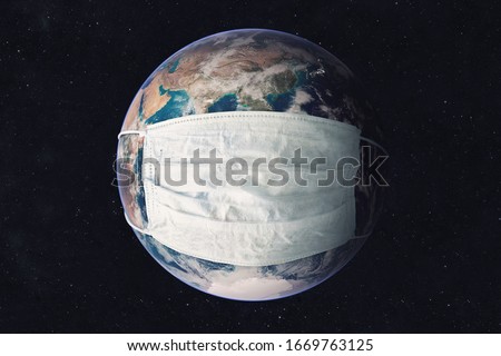 Earth planet in medicine mask to fight against Corona virus. Concept of fight against epidemic and climate change. Pollution of the planet by exhaust gases. Elements of this image furnished by NASA