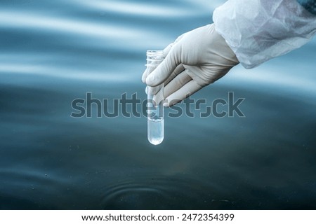 Similar – Image, Stock Photo Hand with analysis tube on blue background with copy space