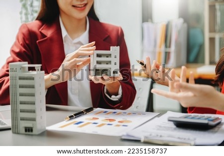 Customers who choose to buy a condominium room and a bank approve a loan for their purchase. Condominium and house loan interest rate from bank concept Сток-фото © 