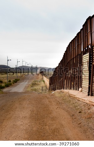 Arizona-Mexico border wall and road