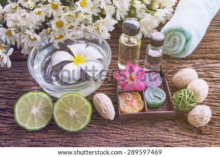 Thai herbal for spa therapy with Kaffir Lime on wooden background