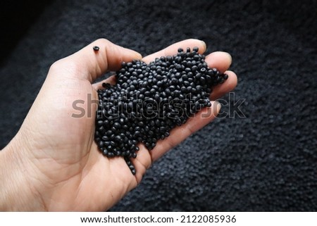 Plastic pellets for production,plastic polymer dye granules color black Foto d'archivio © 