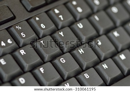 Computer keyboard. Close up of keys on an angle. Bottom left to top right.