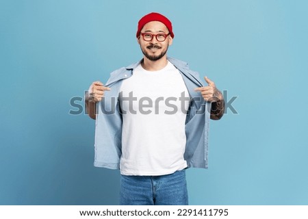 Similar – Image, Stock Photo Asian man in eyeglasses on street