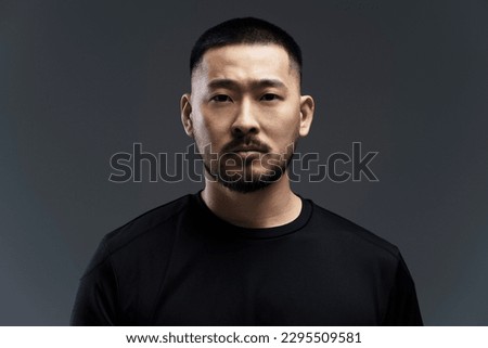 Similar – Image, Stock Photo Young male model standing in studio