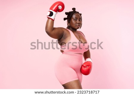 Similar – Image, Stock Photo Female boxer punching camera