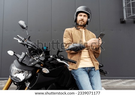 Similar – Image, Stock Photo Stylish man standing near wall