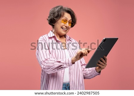 Similar – Image, Stock Photo Senior woman using tablet