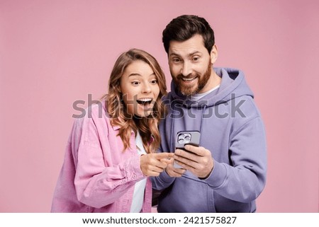 Similar – Image, Stock Photo Couple using a mobile phone while having breakfast together at home.