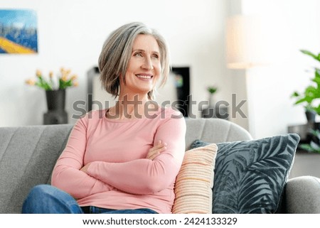 Image, Stock Photo Relaxed senior woman at home by the window