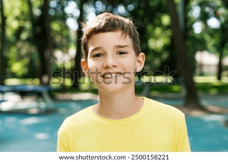 Similar – Image, Stock Photo young caucasian teenage boy playing acoustic guitar on the beach. sunglasses and dark clothing.