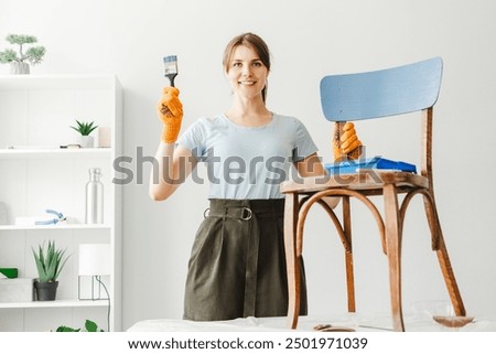 Similar – Image, Stock Photo Cheerful woman painting in workshop