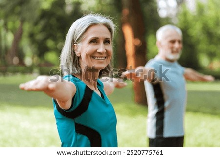 Similar – Image, Stock Photo Senior woman in sportswear jogging through the forest