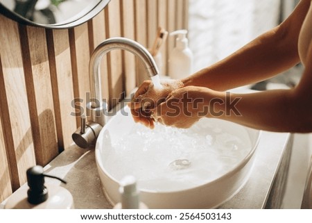 Image, Stock Photo Woman washing her hands