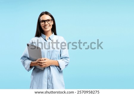 Similar – Image, Stock Photo Cheerful businesswoman browsing tablet in office