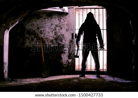 Similar – Image, Stock Photo Murderer, standing in black letters, as lettering, on an old squat house, with many windows, behind a brick wall painted with graffiti. Sign as an appeal against racism, war, hatred, violence, brutality and discrimination.