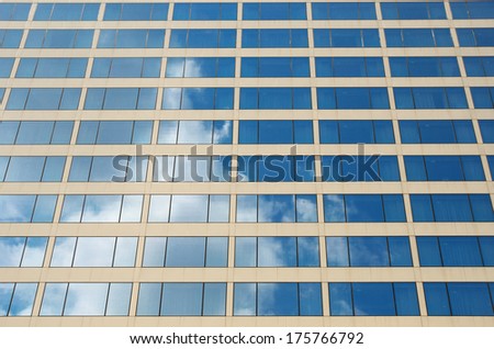 Modern office building in urban city, windows background