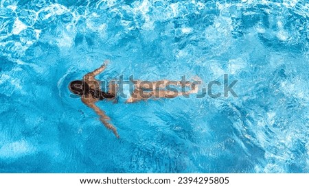 Image, Stock Photo Young happy woman swimming in the sea in sunset