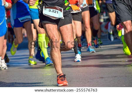 Marathon running race, people feet on road, sport, fitness and healthy lifestyle concept