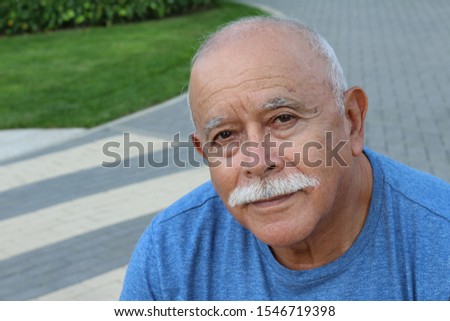 Similar – Image, Stock Photo A man in a hat looks friendly and a little bit melancholic into the camera