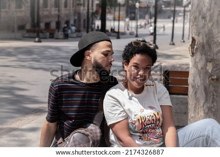 Young black Brazilian couple in downtown São Paulo square Imagine de stoc © 