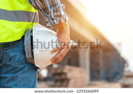 Similar – Image, Stock Photo Road construction worker with orange pants and shovel