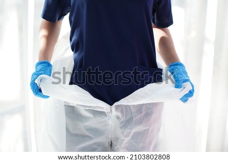 Similar – Image, Stock Photo Physician wearing personal protective equipment performing a Coronavirus COVID-19 PCR test