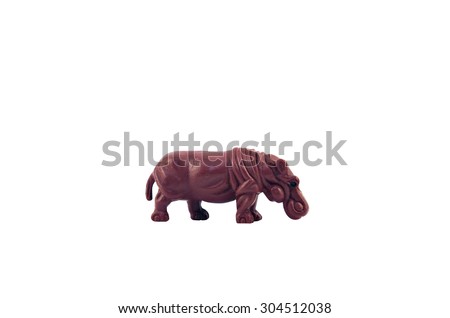 Isolated  hippopotamus toy. Isolated hippopotamus toy side view.