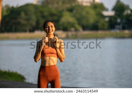 Similar – Image, Stock Photo Sportswoman looking lake from pier