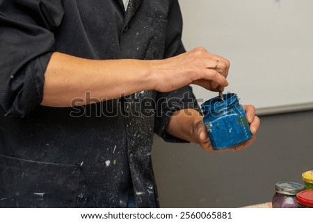 Similar – Image, Stock Photo male artist preparing paints