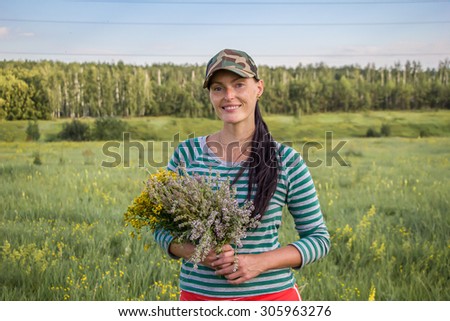 LIPETSK REGION, RUSSIA - 25 JULY, 2015: girl summer forest herbs