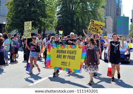 OTTAWA, CANADA - AUG 26:  Unidentified Gay Pride participants take part in the Pride Parade on August 26, 2012 in Ottawa, Ontario, Canada.