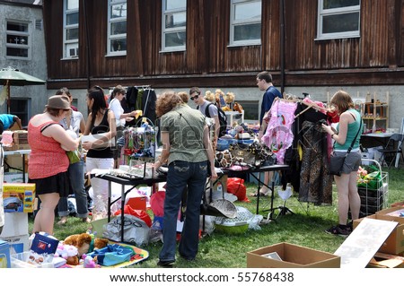 OTTAWA, CANADA - MAY 29: Thousands of people gather at the annual Glebe neighborhood garage sale which takes place for several blocks in the Glebe area of Ottawa, Ontario May 29, 2010.