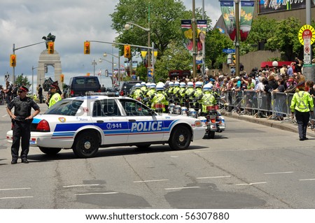OTTAWA, CANADA - JUNE 30: Ottawa police force provides security for Queen Elizabeth\'s visit to the National Arts Centre in Ottawa, Ontario, June 30, 2010.