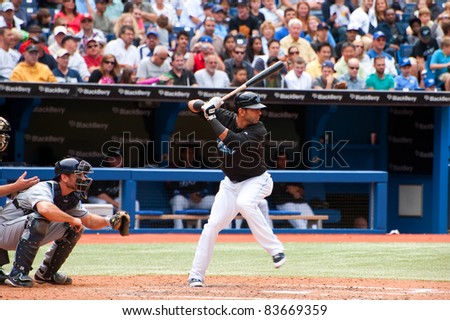 TORONTO, CANADA - AUG 28:  Reigning AL home run king Jose Bautista at bat against the Tampa Bay Rays at the Rogers Centre August 28, 2011 in Toronto, Ontario, Canada.
