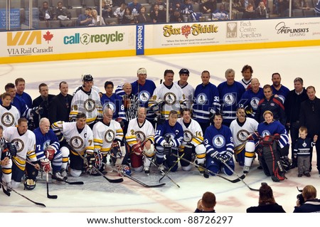 TORONTO, CANADA - NOV 13:  Hockey superstars pose for photo after the Hockey Hall of Fame Legends Classic game played at the Air Canada Centre on Nov 13, 2011 during induction ceremonies in Toronto, Canada.
