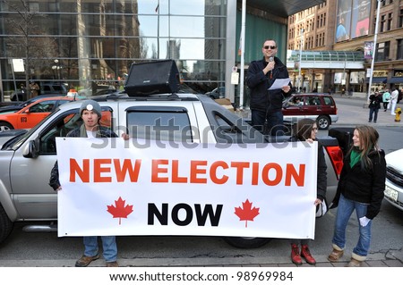 TORONTO, CANADA- MAR 31:  Protesters gathered to protest the election fraud committed in the last Canadian federal election and to call for election reform  Mar 31, 2012 in Toronto, Ontario.