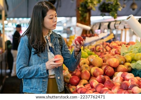 Similar – Image, Stock Photo woman picking peaches in field