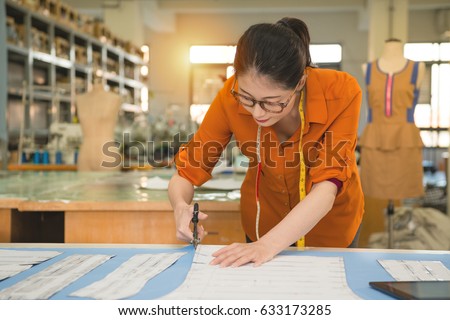 Similar – Image, Stock Photo Female tailor drawing cutout in workshop