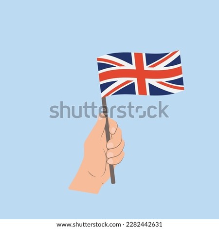 Flag of United Kingdom of Great Britain and Northern Ireland, Hand Holding flag