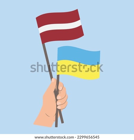 Flags of Latvia and Ukraine, Hand Holding flags