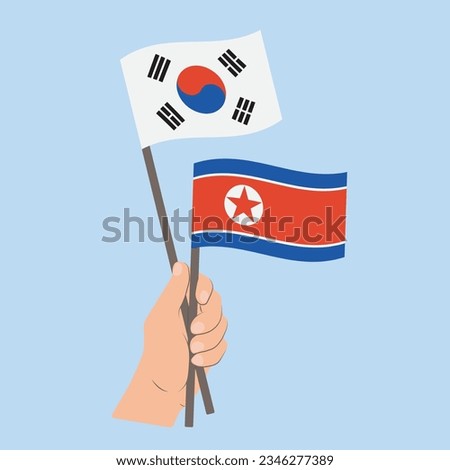 Flags of South Korea and North Korea, Hand Holding flags