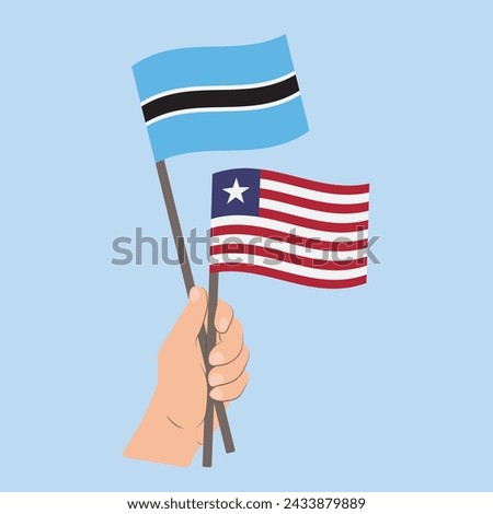 Flags of Botswana and Liberia, Hand Holding flags