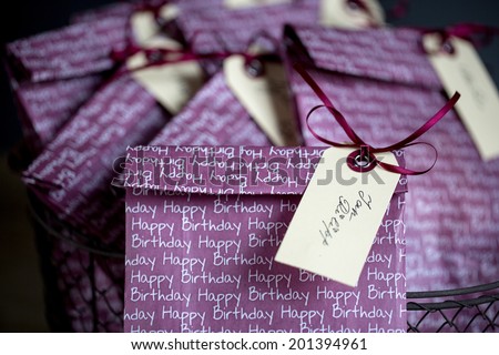 Violet Gift Bags with Name Tags at childs birthday party