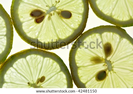 Sliced Lemon isolated on white with backlight