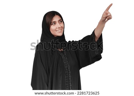 Similar – Image, Stock Photo Charming Arab woman in hijab looking at camera