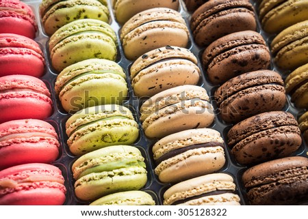 Macarons dessert in a row in a box